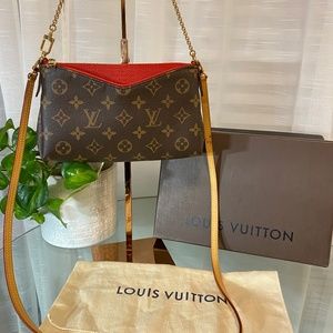 Authentic Louis Vuitton Pallas clutch in red